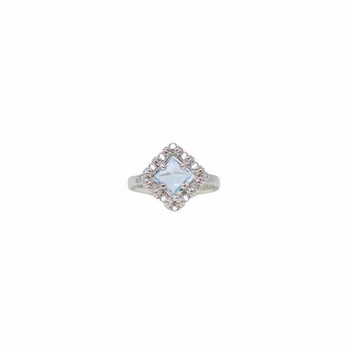 Anello Quadra in Rodio con Topazio Azzurro