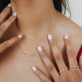 Collana Whisper Mezza Luna in Oro Giallo con Punti Luce di Diamanti