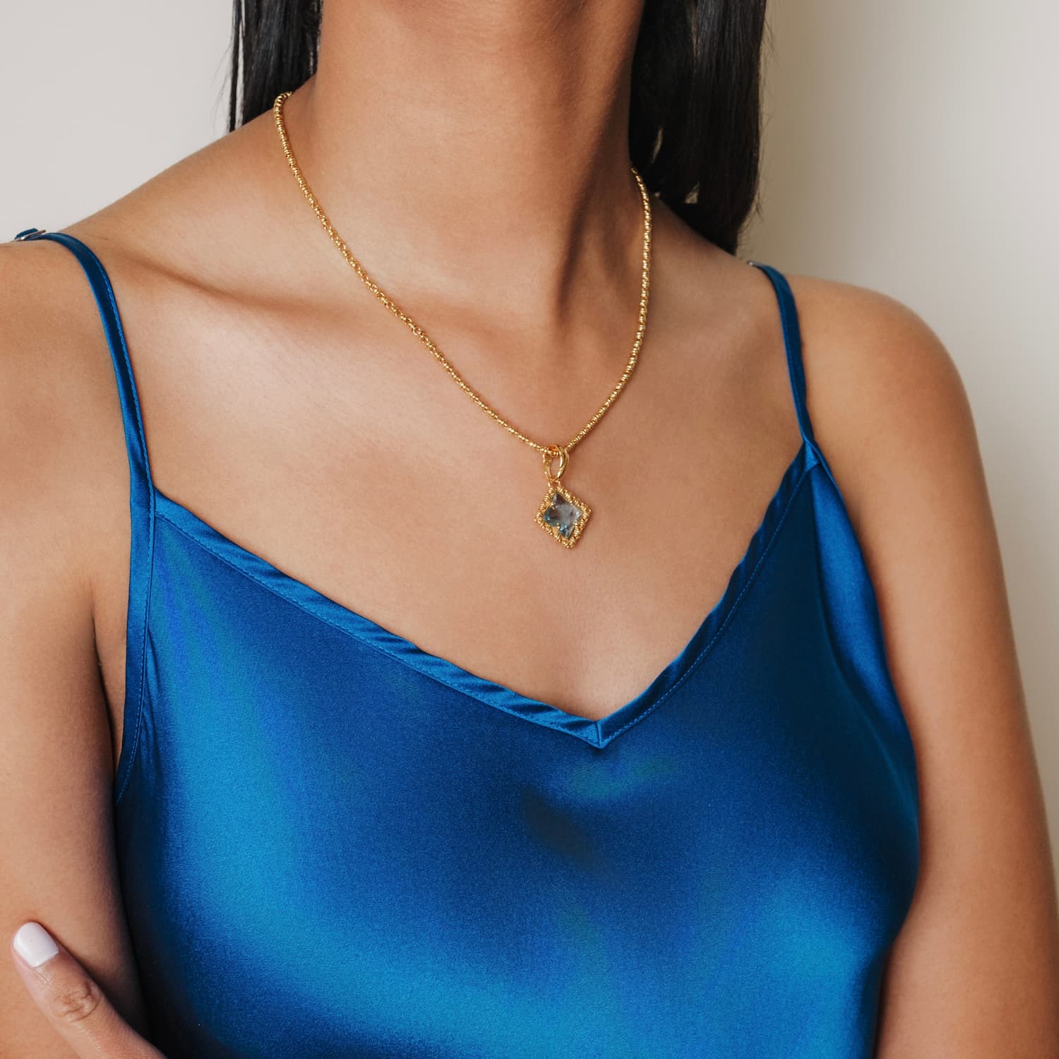 Pendente Quadra in Oro con Topazio Azzurro